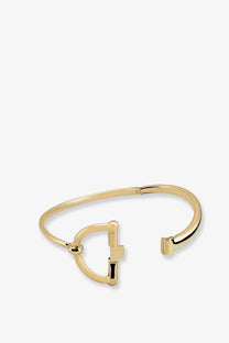 Gold-tone metal bangle with a distinctive horsebit-style clasp in gucci women’s half horsebit choker gold