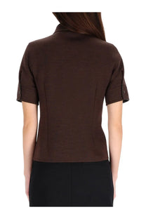 Gucci women’s brown half sleeve shirt featuring a tailored fit and buttoned cuffs in a short-sleeved blazer style