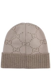 Beige Gucci women’s jacquard GG knit beanie hat with subtle interlocking G logo pattern and ribbed cuff