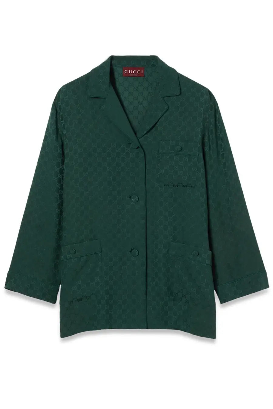 Dark green Gucci women’s jacquard blazer with subtle repeating GG monogram pattern across the fabric