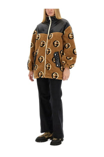 Beige gucci women’s jacquard zipper jacket with brown teddy bear texture black logo circles and glossy black shoulders
