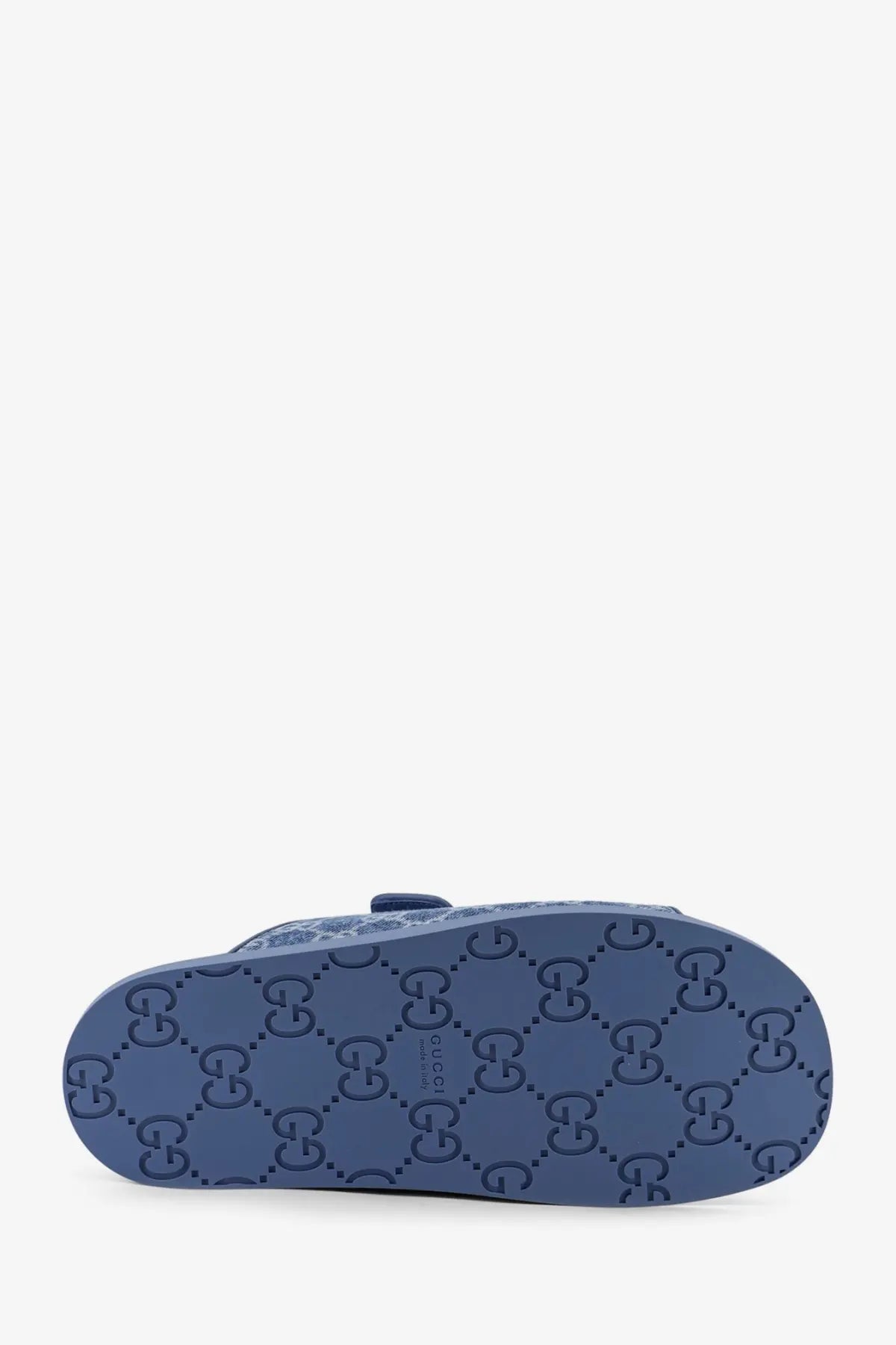 Blue gucci laser gg denim slide sandal with interlocking g logo pattern on the sole for women