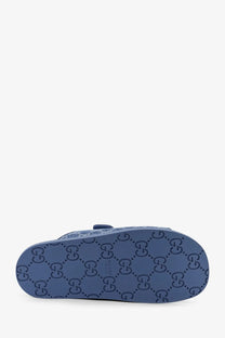 Blue gucci laser gg denim slide sandal with interlocking g logo pattern on the sole for women