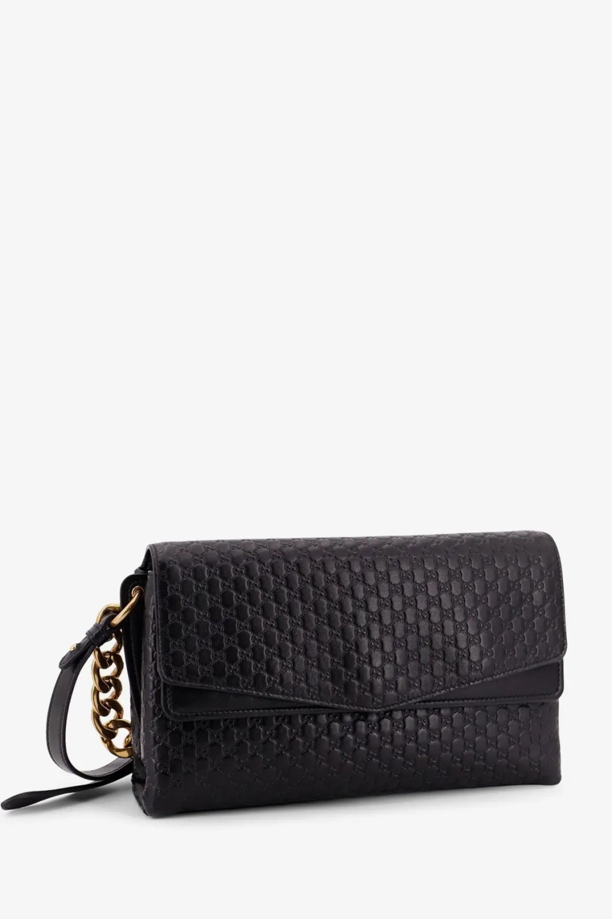 Gucci women’s black leather crossbody bag with embossed monogram pattern and gold-tone chain strap