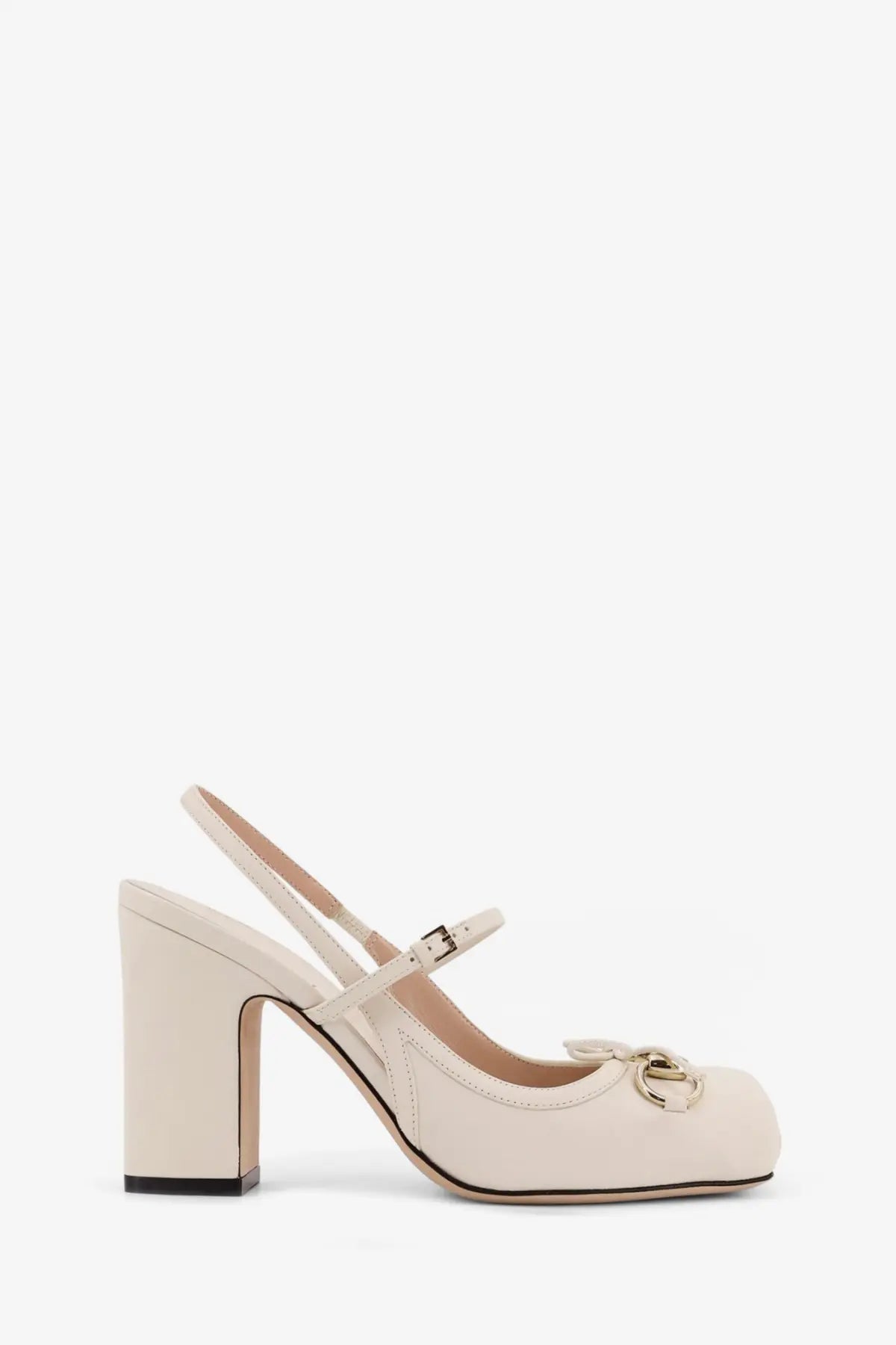 Cream-colored Gucci women’s leather Mary Jane pump with block heel and gold-tone horsebit buckle