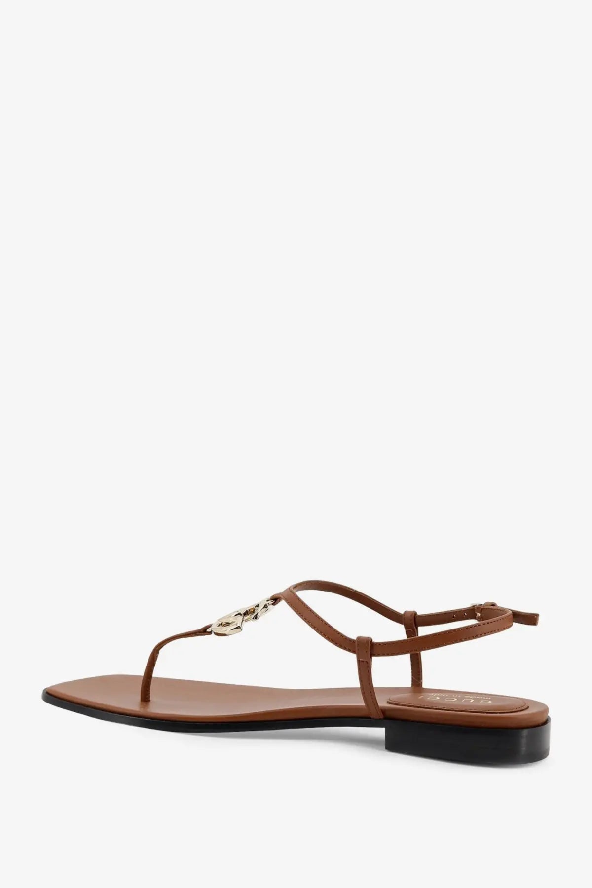 Gucci women’s Lifford yellow leather t-strap sandal with metallic chain-link detail and low black heel