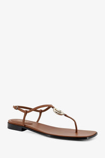 Gucci women’s lifford brown leather thong sandal with silver-toned rose emblem on the toe strap