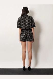 Gucci women’s lightweight lamé wool tweed shorts romper in black with silver GG logo pattern and matching belt