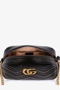 Gucci women’s matelassé black leather camera bag with gold-tone gg logo and chain strap crossbody bag