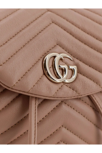 Beige quilted leather Gucci women’s mini gg marmont backpack with gold tone interlocking gg logo clasp