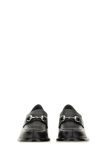 Gucci women’s black leather moccasin loafers with polished finish and silver horsebit buckle