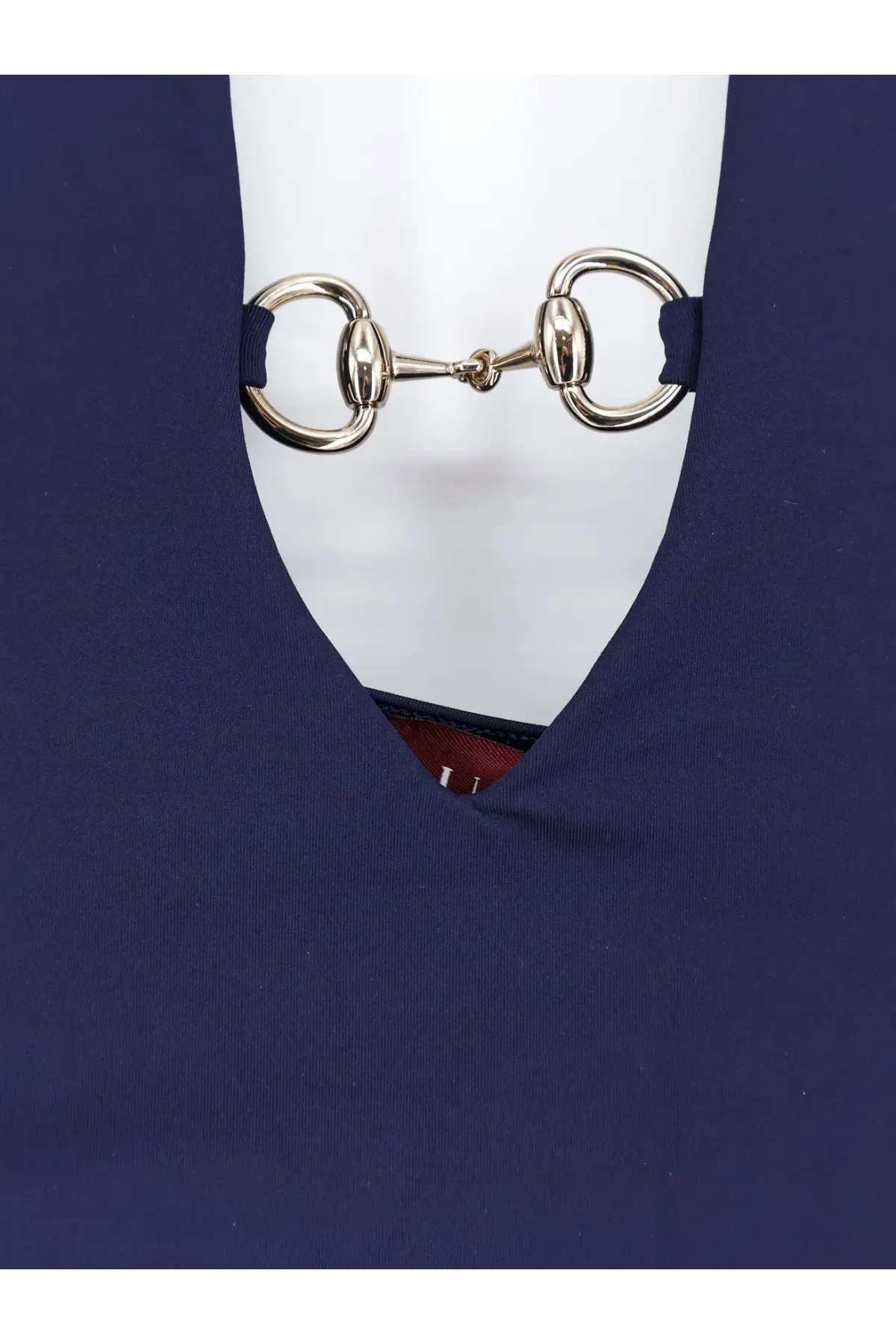 Silver horsebit clasp with navy blue leather straps on gucci women’s one piece swimsuit white back side