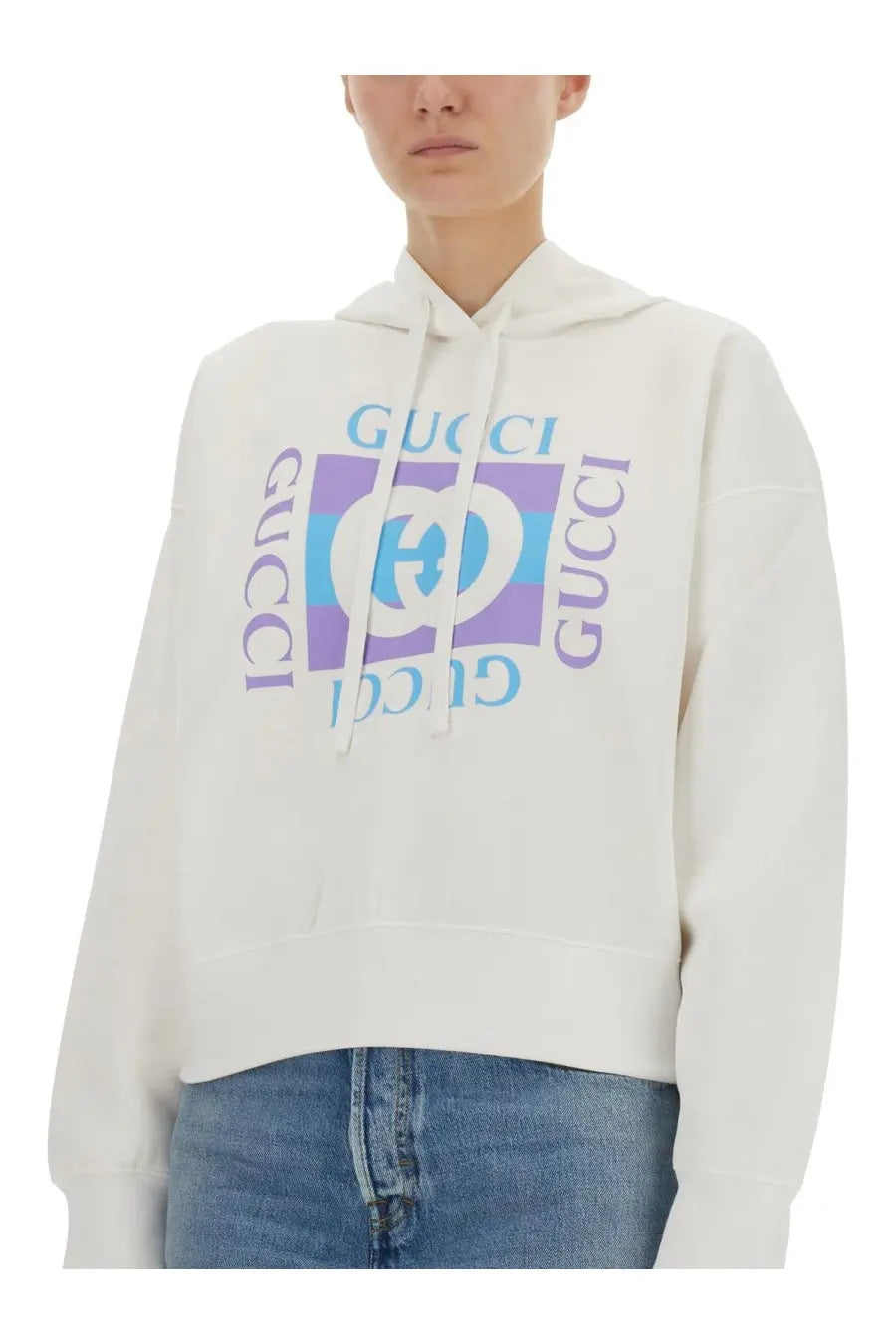 White Gucci women’s printed cotton hoodie with bold colorful logo print featuring purple and blue accents