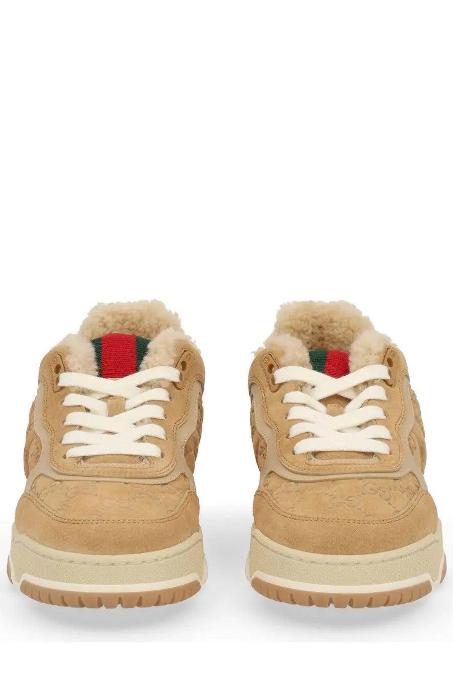 Tan suede Gucci women’s re web sneaker with white laces and plush fluffy lining in brown color