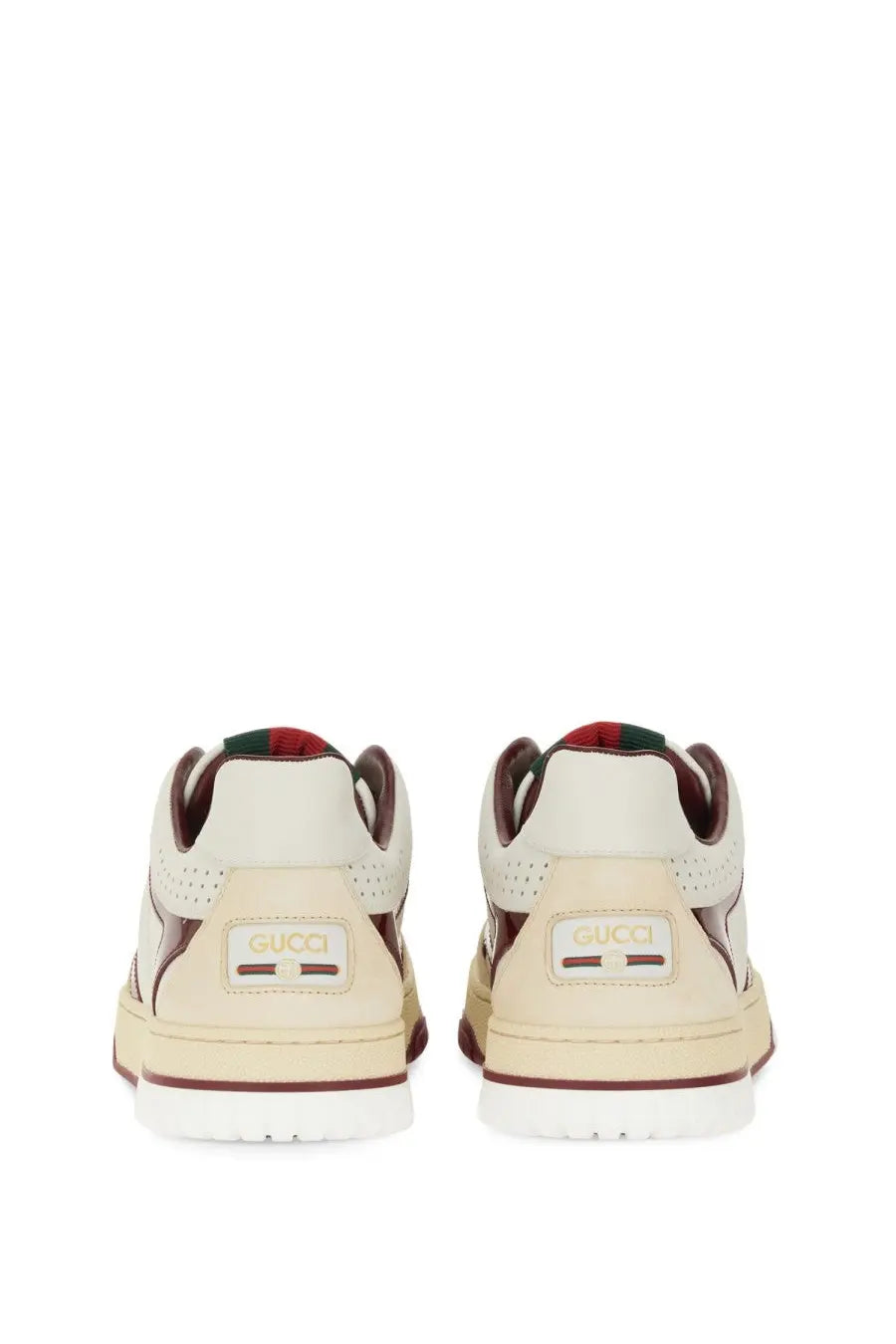 Cream-colored Gucci women’s RE Web sneaker with brown accents and perforated leather uppers in white design
