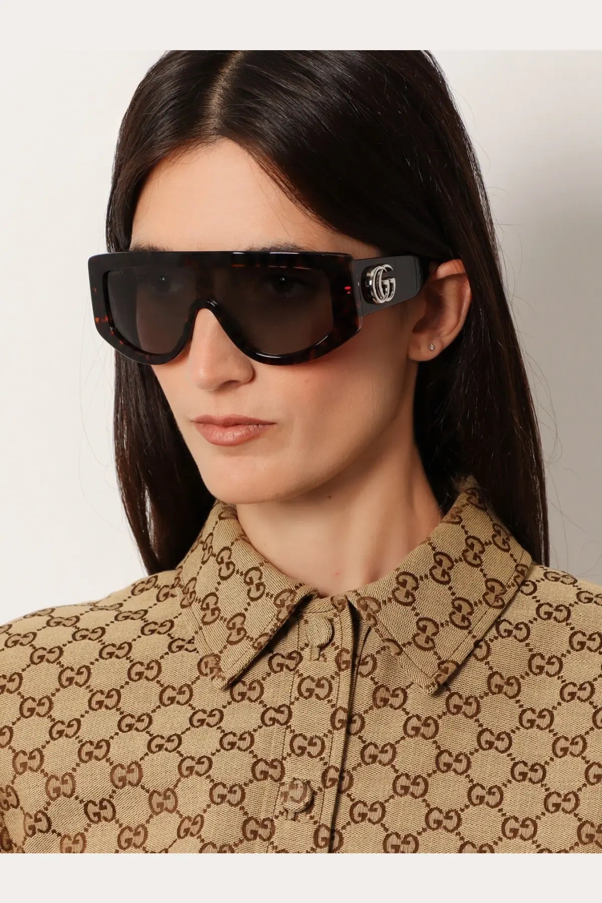 Gucci women’s rectangular acetate sunglasses in black with bold oversized frame and double G logo on the temple