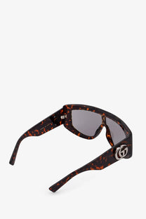 Gucci women’s rectangular acetate sunglasses in tortoiseshell pattern with sleek angular frames and mirrored lenses