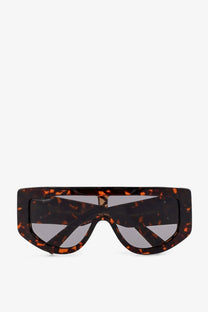Gucci women’s rectangular acetate sunglasses in tortoiseshell pattern with dark gray lenses and modern design
