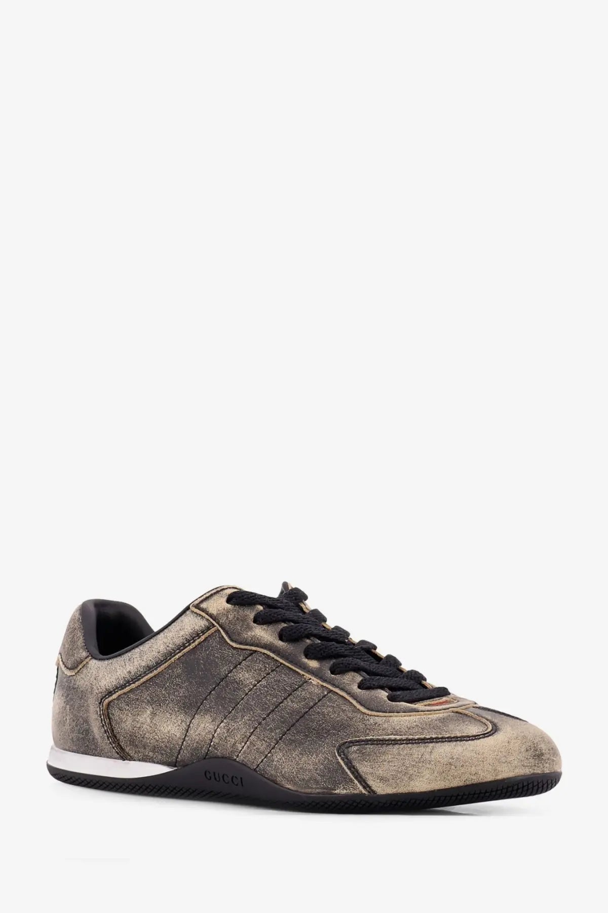 A distressed metallic bronze gucci women’s shift élavé leather sneaker with black laces and white midsole