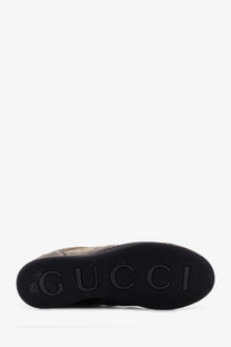 Black gucci women’s shift élavé leather sneaker sole with embossed logo and textured rubber tread