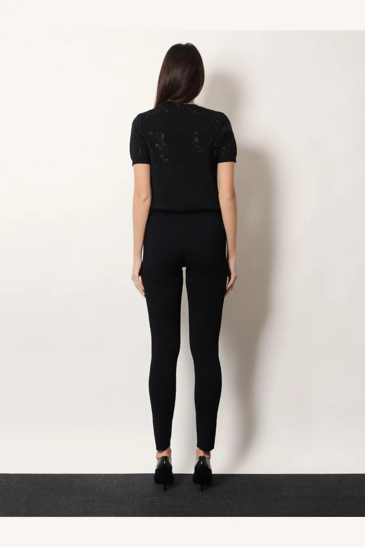 Gucci women’s black short wool dress featuring short sleeves and sparkling embellishments