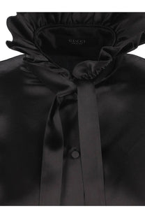 Black satin Gucci women’s silk blouse with ruffled collar and matching bow tie