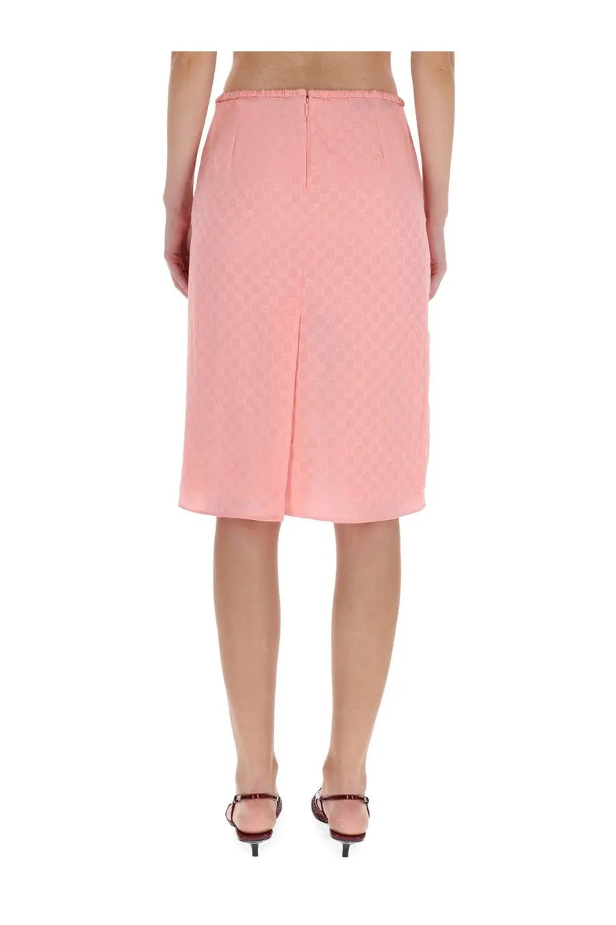 Gucci women’s soft pink silk skirt with subtle texture knee-length and central front slit