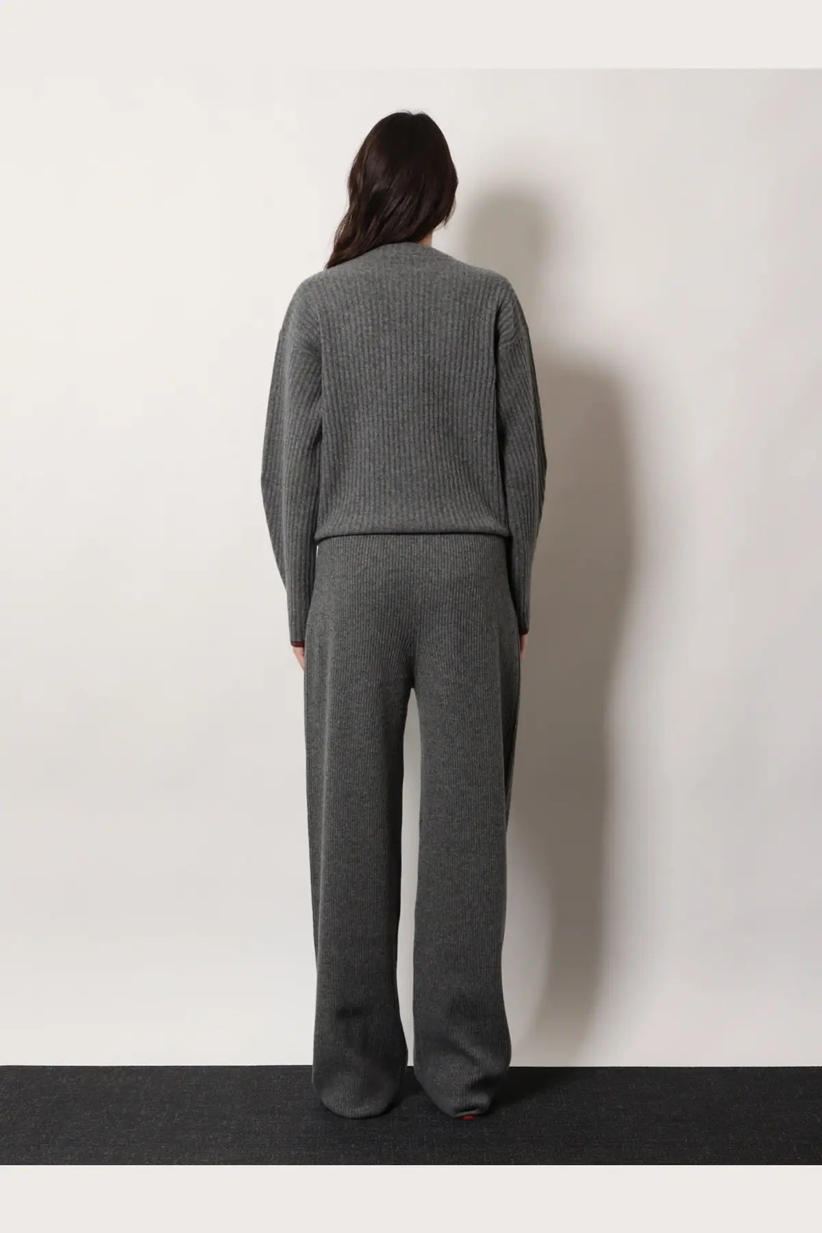 A cozy ribbed gray knit sweatsuit set featuring a long-sleeved top and wide-leg pants by Gucci womens stretch wool trousers gray