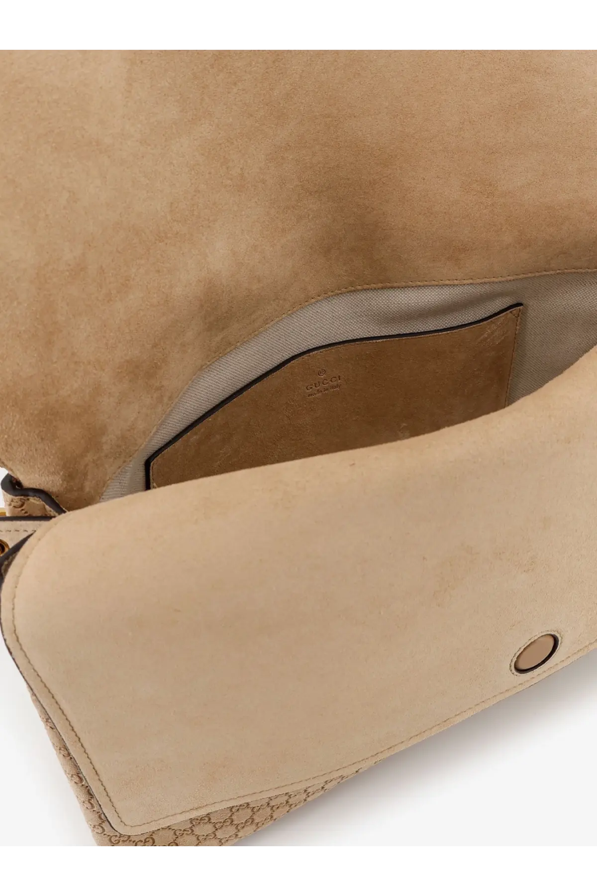 Beige gucci women’s suede shoulder bag with textured patterned trim and interior lining in spicy ging style