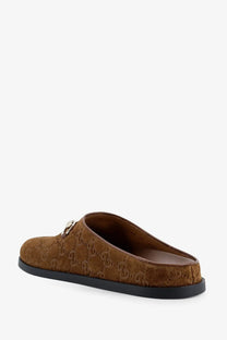 Gucci women’s grey suede mule slip-on sandals with brown gg monogram and silver metal accent at the vamp