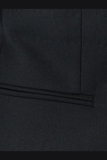 Black textured fabric pocket with precise stitching and subtle sheen on gucci women’s technical wool blazer black