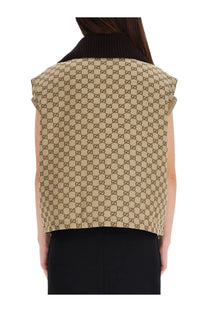 Beige Gucci women’s sleeveless vest with GG supreme print and black ribbed collar made from durable canvas material