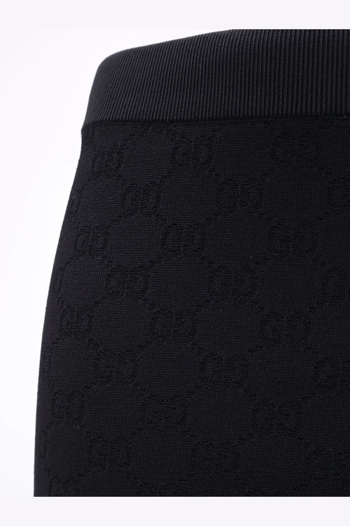 Black gucci womens viscose blend leggings with a subtle interlocking GG pattern woven into the fabric
