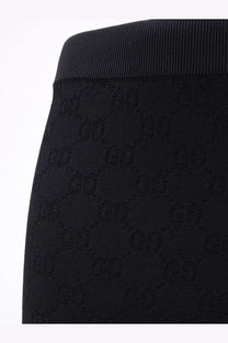 Black gucci womens viscose blend leggings with a subtle interlocking GG pattern woven into the fabric