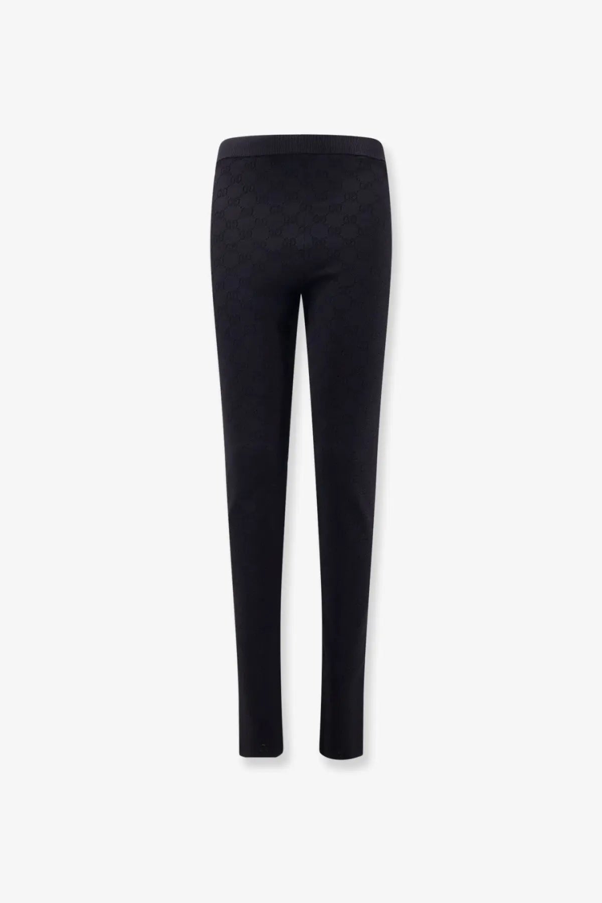 Gucci women’s black viscose blend leggings with smooth stretchy fabric and subtle textured pattern on legs