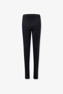 Gucci women’s black viscose blend leggings with smooth stretchy fabric and subtle textured pattern on legs