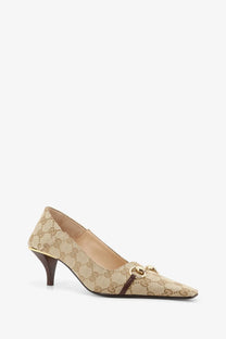 Gucci women’s Vittoria beige and brown GG supreme canvas pumps with gold-tone horsebit buckle