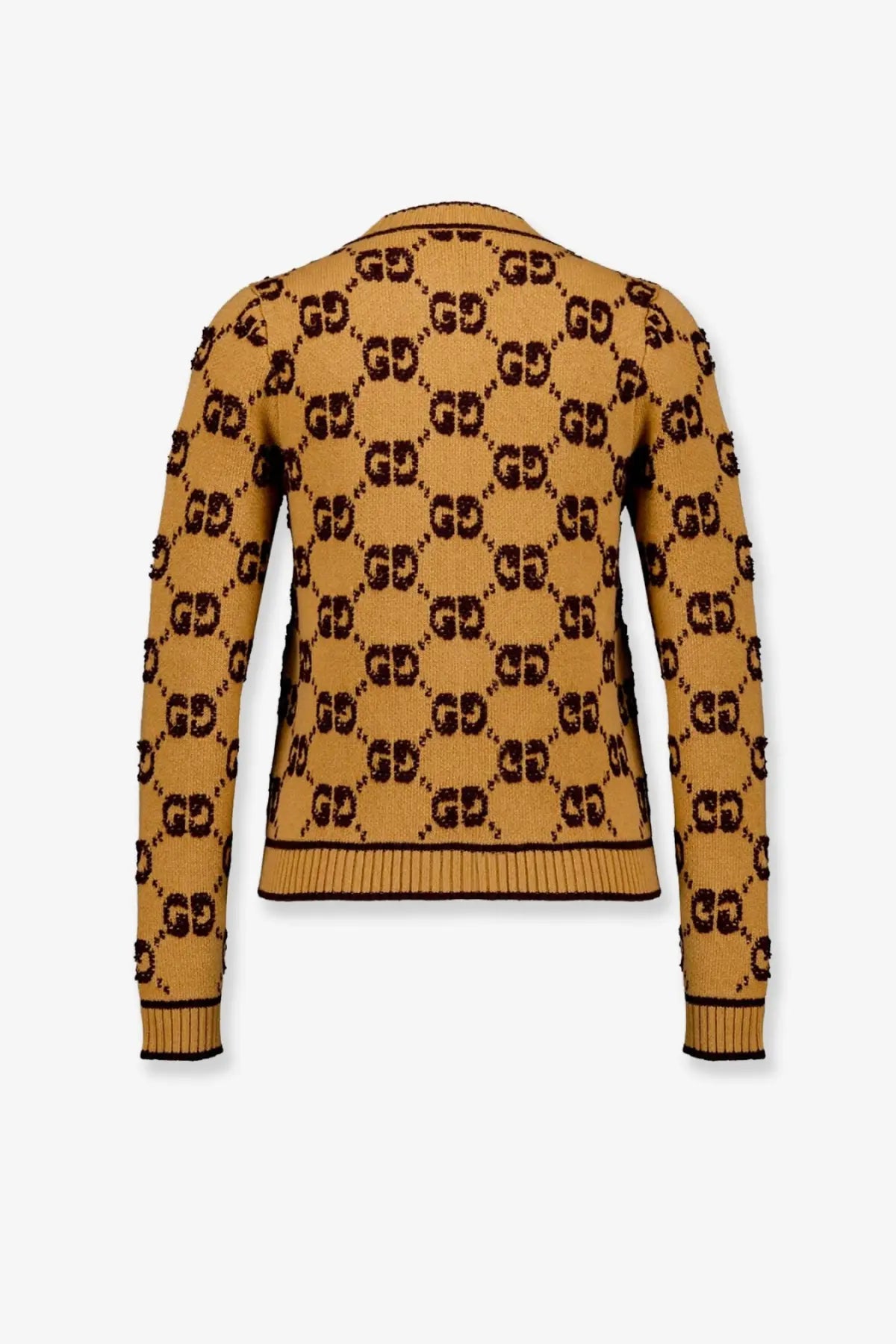 Back of a mustard yellow gucci women’s wool cardigan with black gg monogram pattern ribbed cuffs and hem