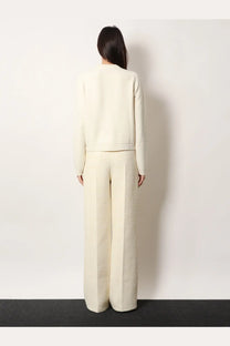 Gucci women’s cream-colored wool and cashmere knit sweater with round neckline and matching wide-leg trousers