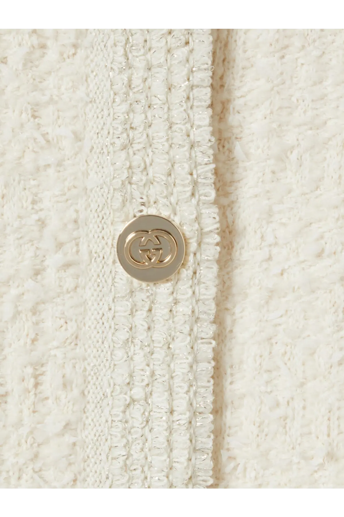 A cream-colored tweed button with a gold-tone interlocking gg logo on gucci womens wool and cotton blend cardigan white