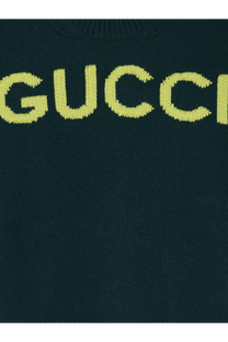 Gucci women’s dark green wool knit sweater with bold neon yellow lettering across the chest