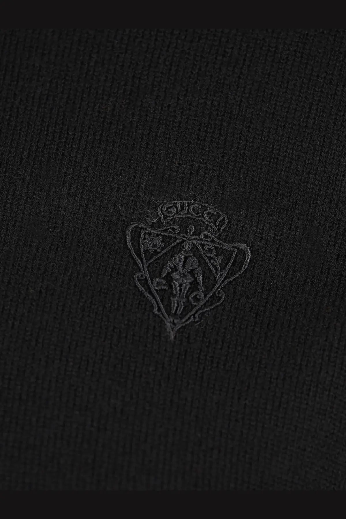 Black gucci logo embroidered on textured wool fabric of gucci womens wool turtleneck in black