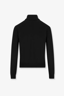 Gucci women’s black wool turtleneck sweater with ribbed cuffs and hem for a stylish and warm look