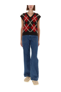 Guest in residence women’s argyle vest multicolor featuring a red black and white knit sleeveless top with argyle pattern