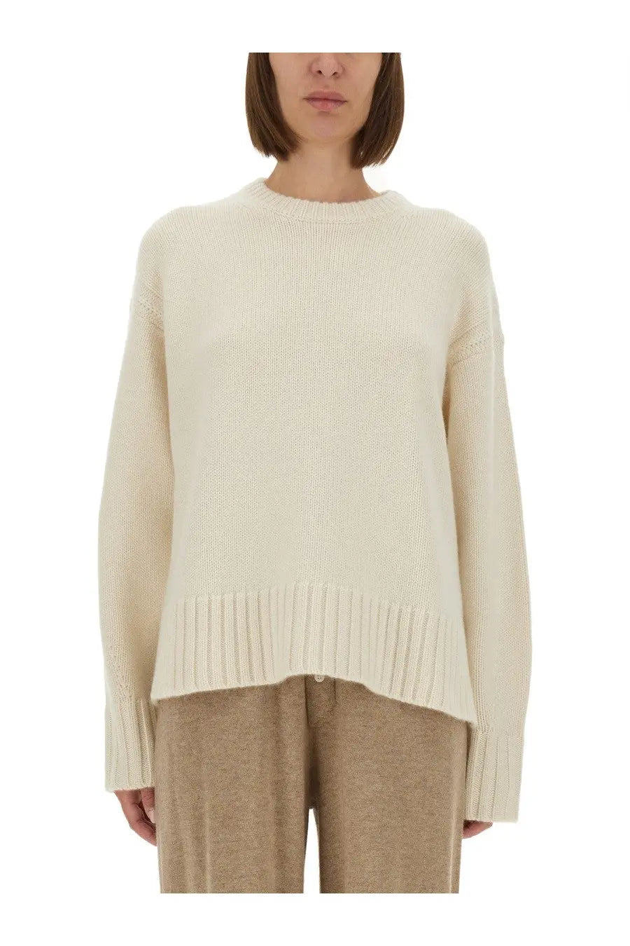 Guest In Residence women’s cozy crew shirt beige cream ribbed knit sweater with relaxed fit and asymmetrical hem