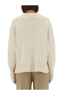 Guest In Residence women’s cozy crew beige ribbed-knit sweater with subtle textured patch at the neckline
