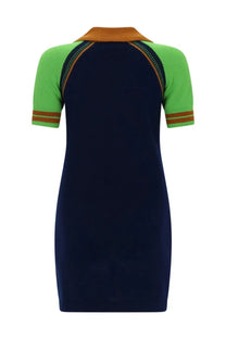 Guest in residence women’s mini dress ace blue navy blue knit with bright green shoulder panel and orange-brown collar trim