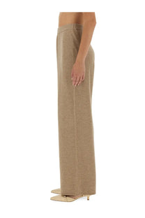 Guest In Residence women’s beige wide-leg trousers with subtle textured weave and high waistband for everyday wear