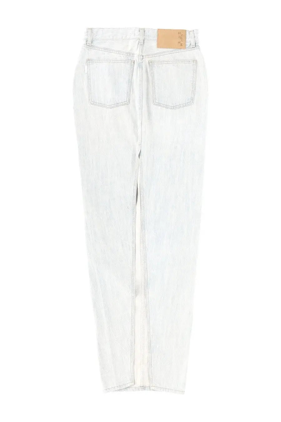 Haikure women’s long denim skirt blue made of light-wash denim with subtle fading and tan leather brand tag at waistband