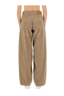 Haikure women’s pants bethany beige tan corduroy wide-leg pants with brown leather brand patch at waistband back view